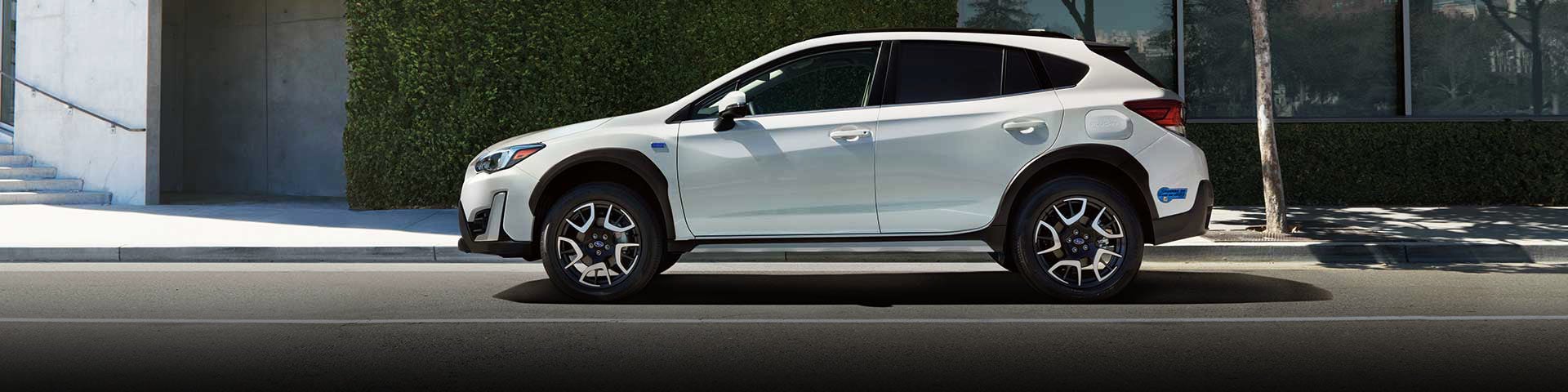 The side profile of a white Subaru Crosstrek Hybrid | John Kennedy Subaru in Plymouth Meeting PA