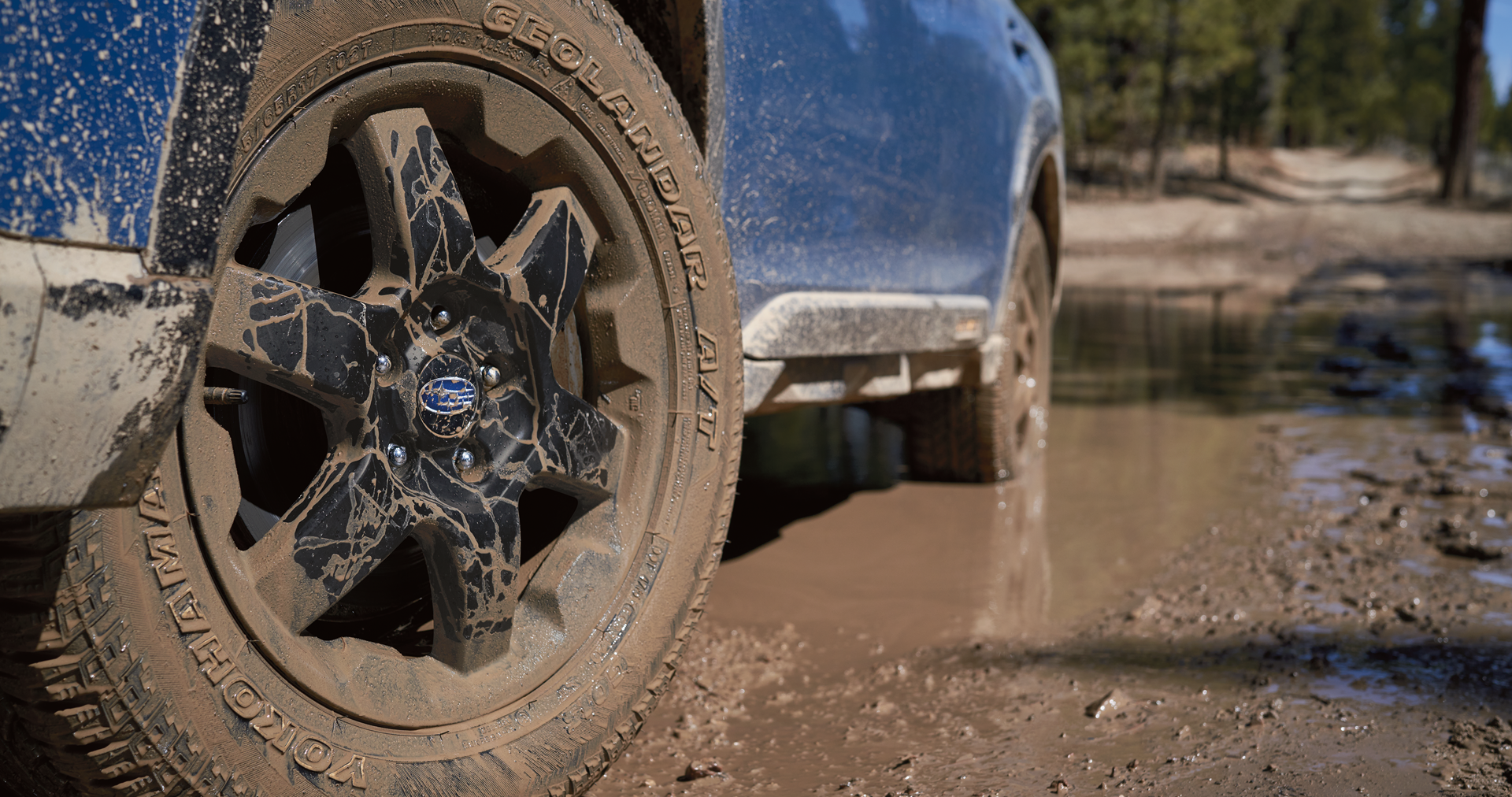 A close-up of the 17-inch off-road wheels and all-terrain Yokohama GEOLANDAR® tires on the 2023 Outback Wilderness. | John Kennedy Subaru in Plymouth Meeting PA