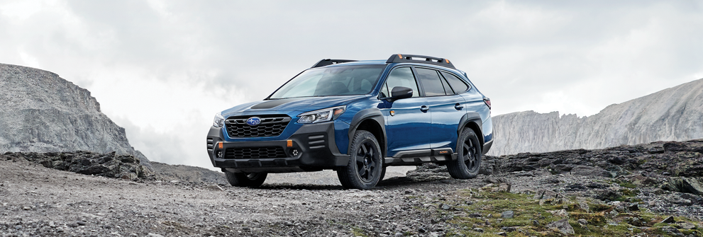 A 2023 Outback Wilderness parked in the mountains. | John Kennedy Subaru in Plymouth Meeting PA